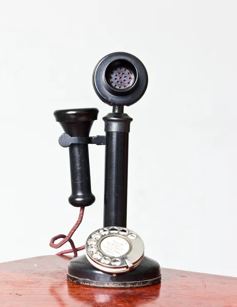 Vintage telefon med det reflektion isolerade — Stockfoto