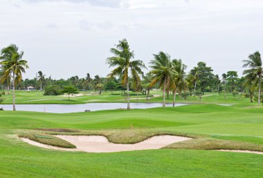 Sand bunker in golf course clipart