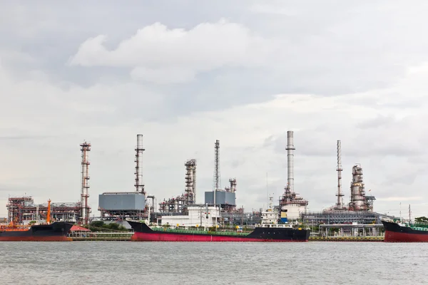 Oil refinery plant along river in Bangkok