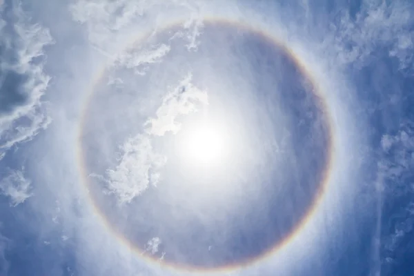 Corona on blue sky, ring around the sun — Stock Photo, Image