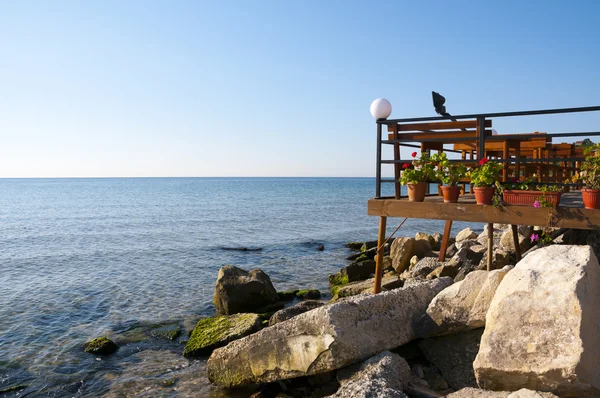 stock image Terrace of a cafe on the sea