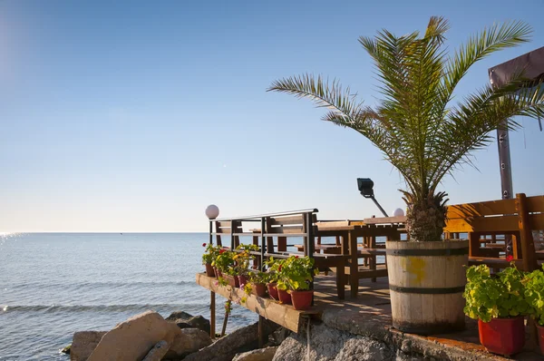 stock image Terrace of a cafe on the sea