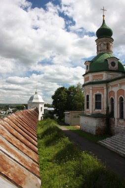 Russia, Yaroslavl region, Pereslavl. Goritskii Monastery Uspensky Cathedral and fortress wall. clipart