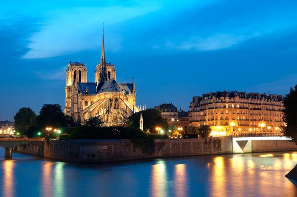 Notre Dame at night in Paris.