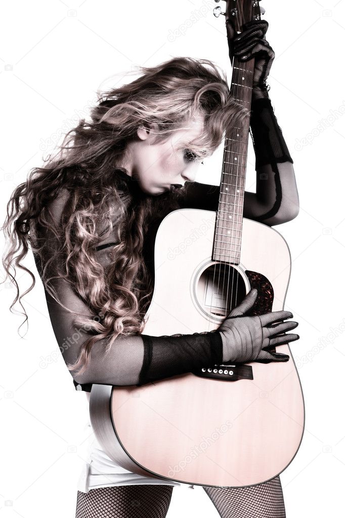 Rocker girl with acoustic guitar