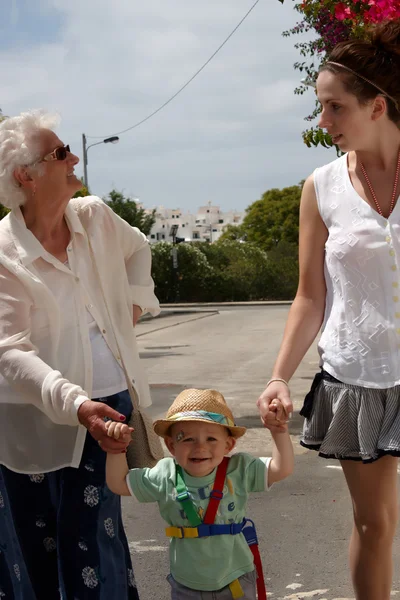 Three generations walking — Stock Photo, Image