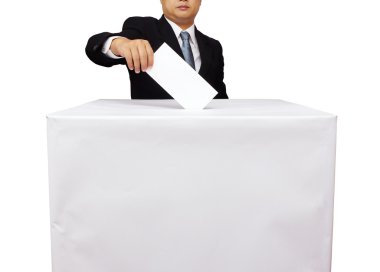 Gentleman hand putting a voting ballot in slot of white box isol clipart