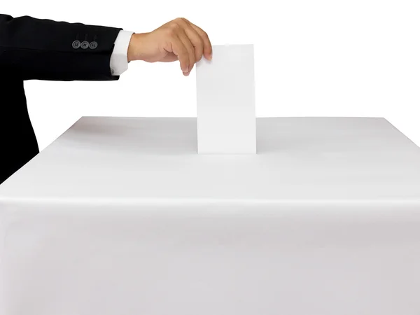 Gentleman Hand legt einen Stimmzettel in Schlitz der weißen Schachtel isol — Stockfoto