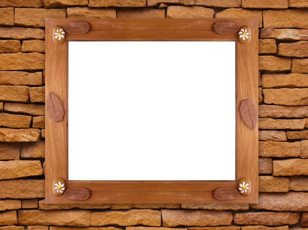 Dřevěný rám na kamenné zdi — Stock fotografie