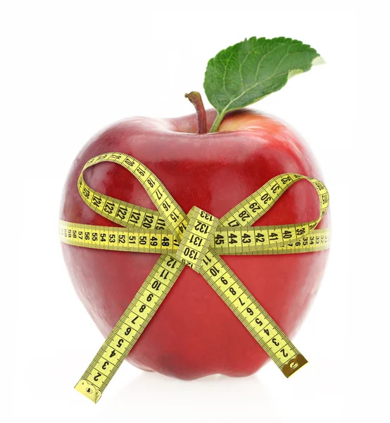 Diyet kavramı. ölçme bant ile elma — Stok fotoğraf