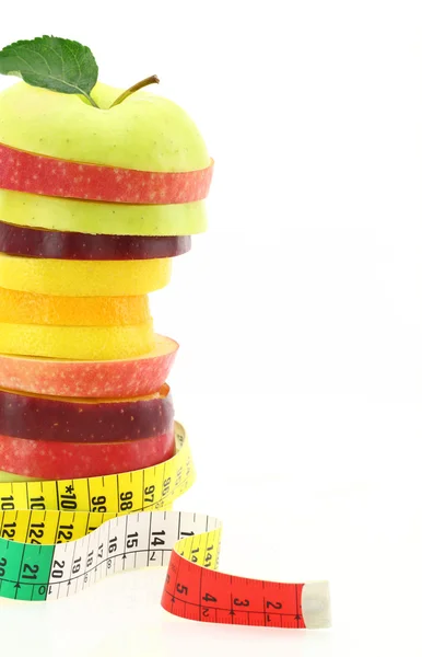 Concept de régime. Fruits avec ruban à mesurer — Photo
