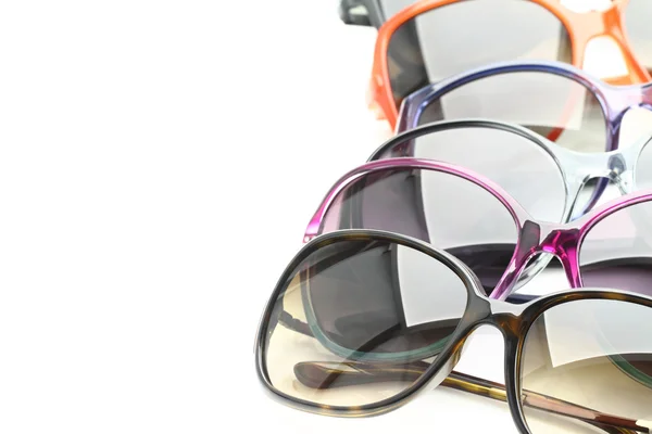 Coleção de óculos de sol sobre fundo branco — Fotografia de Stock