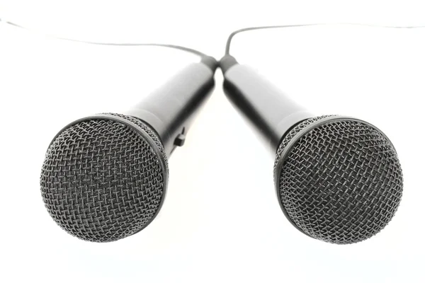 Dos micrófonos sobre fondo blanco- var. 3. Imagen de archivo
