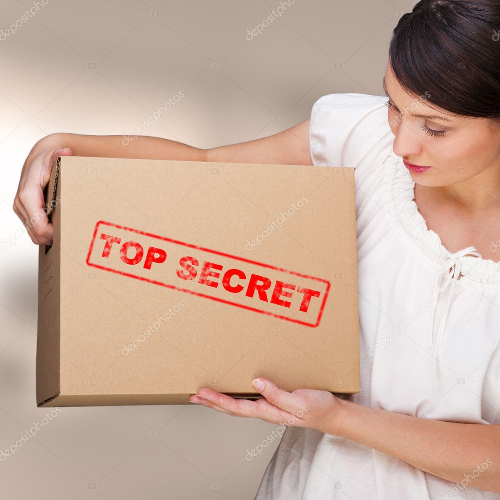 Portrait of young pretty woman with top secret package cardboard