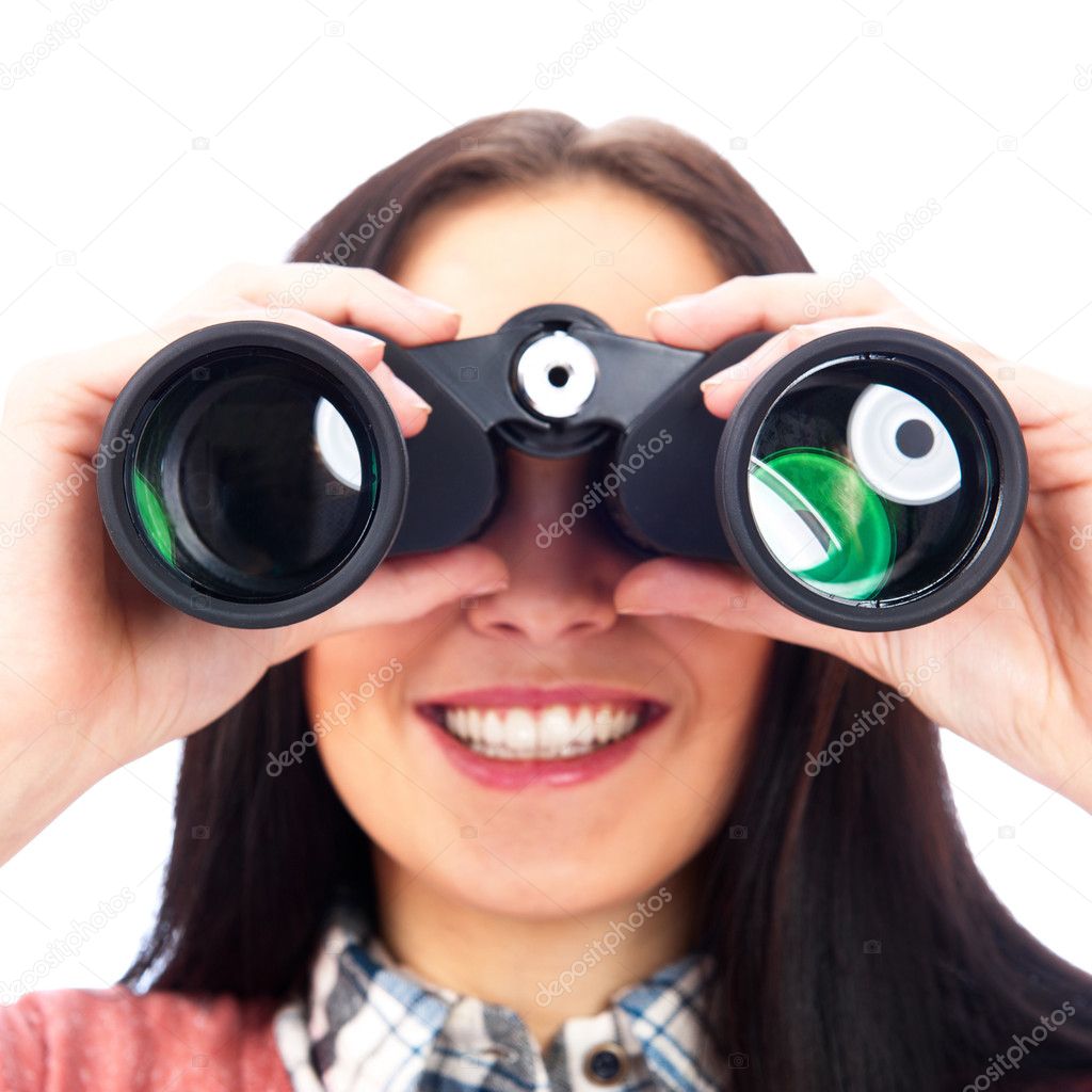 Woman looking through binoculars isolated on white