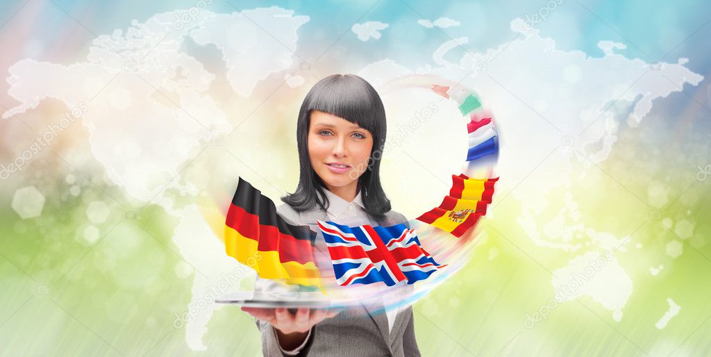 Young woman wearing suit holding tablet computer. Flags of Europ