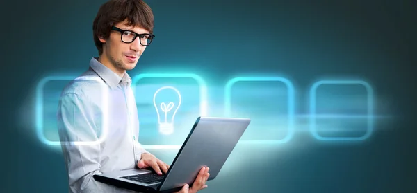 Affärsman hålla laptop och arbeta med virtuella gränssnitt. sammanfogning av teknik koncept — Stockfoto