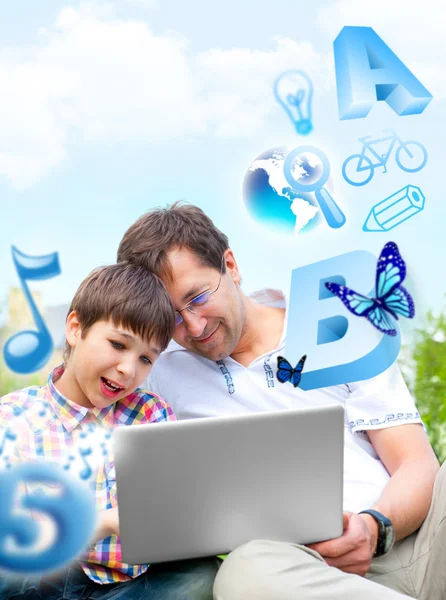 Closeup portrait of happy family: father and his son educating u — Stock Photo, Image