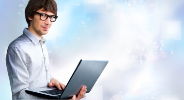 Business man working with his modern computer and virtual interf clipart