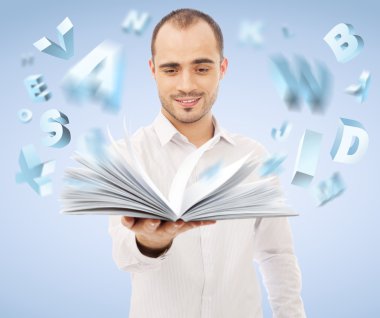 Adult man holding an opened book and reading. Letters are flying clipart