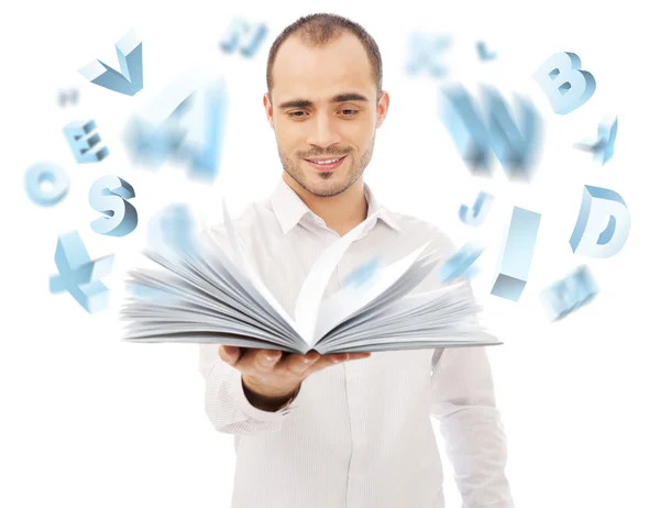 Hombre adulto sosteniendo un libro abierto y leyendo. Las cartas están volando — Foto de Stock