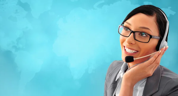 Telemarketing hoofdtelefoon vrouw uit call center glimlachen — Stockfoto