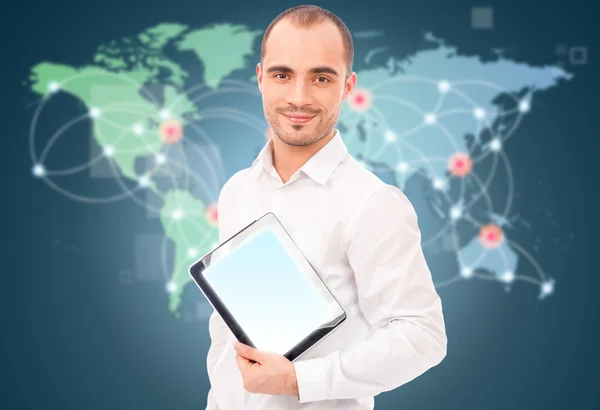 Hombre adulto sosteniendo tableta contra mapa del mundo y servidor p —  Fotos de Stock
