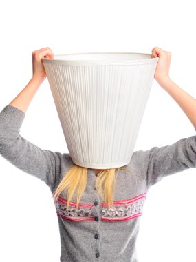 Young woman wearing lampshade on her head. Young head is a place clipart