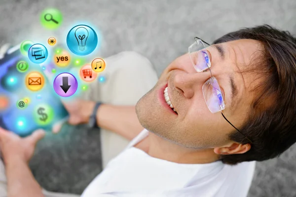 Adult man using his tablet computer to do his tasks everywhere — Stock Photo, Image
