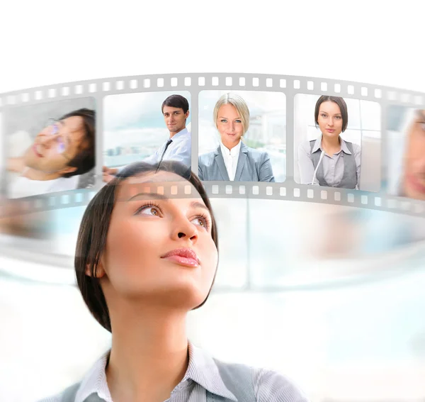 Portrait of businesswoman communicating with her team across the — Stock Photo, Image