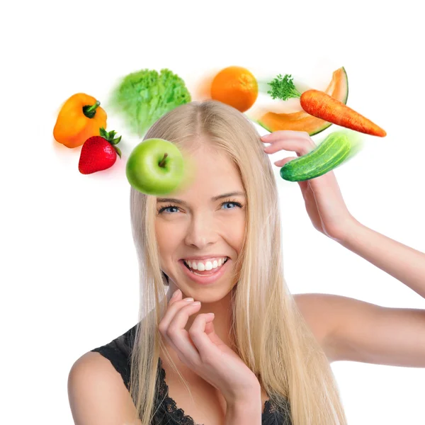 Joven mujer hermosa con verduras, bayas y frutas volando alrededor de su cabeza —  Fotos de Stock