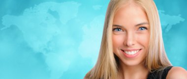 Young beautiful woman standing against worldmap background. Inte clipart