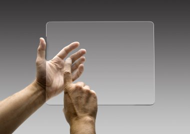 Hands reaching images on a futuristic tablet clipart