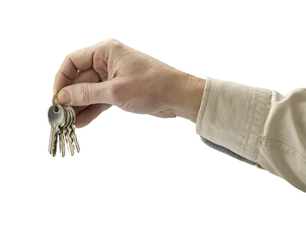 Ludzką ręką i klucz na białym tle — Zdjęcie stockowe