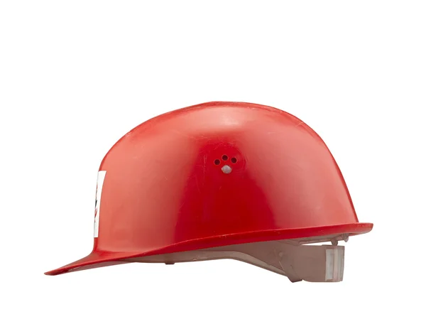 红色塑料安全消防头盔在白色背景上 — 图库照片