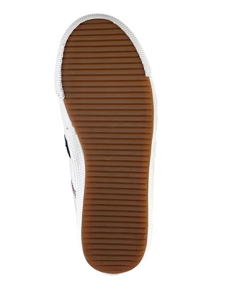 Suela marrón de un zapato sobre un fondo blanco — Foto de Stock