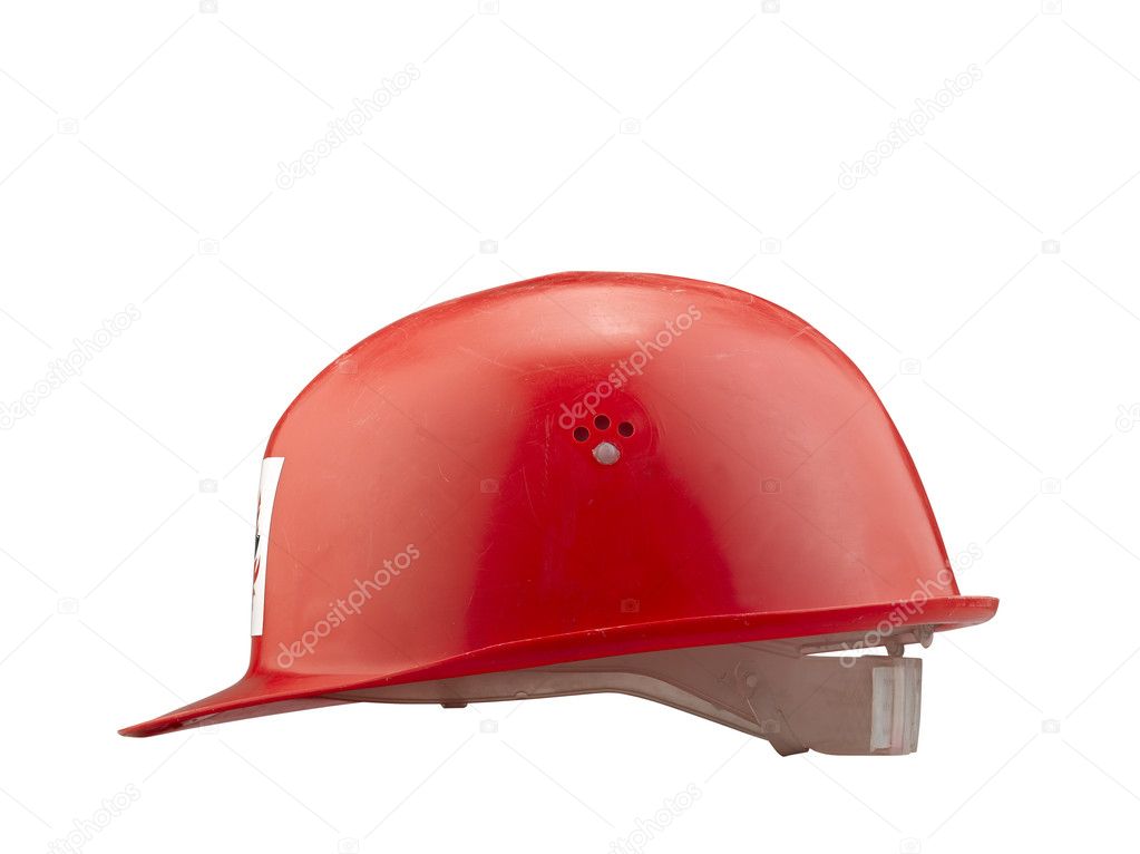 Red plastic safety fire helmet on white background