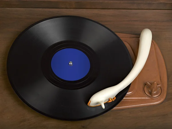 Radiogramófono vintage con un disco de gramófono —  Fotos de Stock