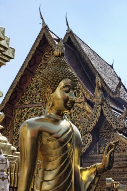 Thailand, Chiangmai, golden Buddha statue in Prathat Doi Suthep Buddhist temple clipart