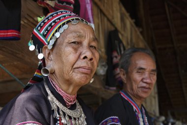 Thailand, Chiang Mai, Karen Long Neck hill tribe village (Kayan Lahwi), Karen couple in traditional costumes clipart