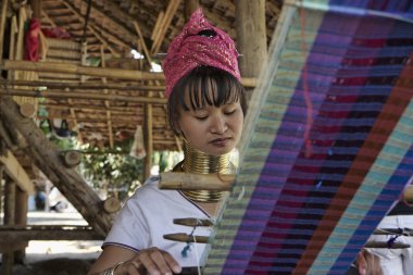 Thailand, Chang Mai, Karen Long Neck hill tribe village (Kayan Lahwi), Long Neck woman in traditional costumes. Women put brass rings on their neck when they are 5 or 6 years old clipart
