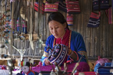 Thailand, Chiang Mai, Karen Long Neck hill tribe village (Kayan Lahwi), Karen woman in traditional costumes clipart