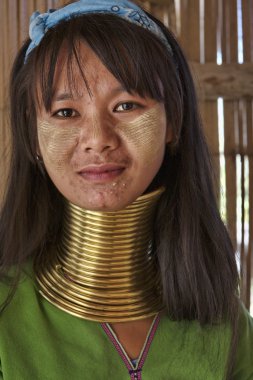 Thailand, Chiang Mai, Karen Long Neck hill tribe village (Baan Tong Lhoung), Long Neck woman in traditional costumes. Women put brass rings on their neck when they are 5 or 6 years old and increase th clipart