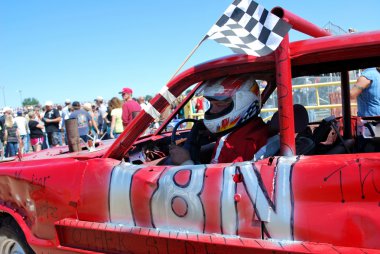 Driver Prepares Drive in a Demolition Derby clipart