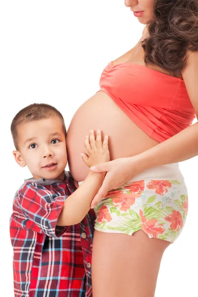 Mulher grávida e um menino — Fotografia de Stock