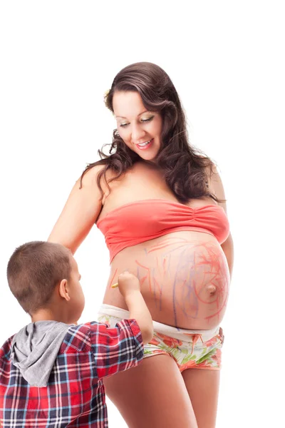 Mujer embarazada y un niño pequeño —  Fotos de Stock