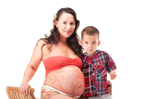 Mujer embarazada y un niño pequeño —  Fotos de Stock