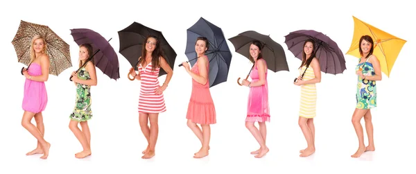 Девочки-зонтики — стоковое фото