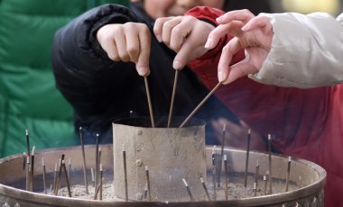 Burning incense, Nara, Japan clipart