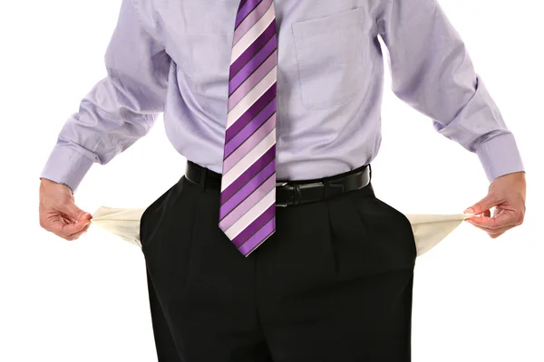 Man Pulling out Empty Pockets Isolated Stock Image